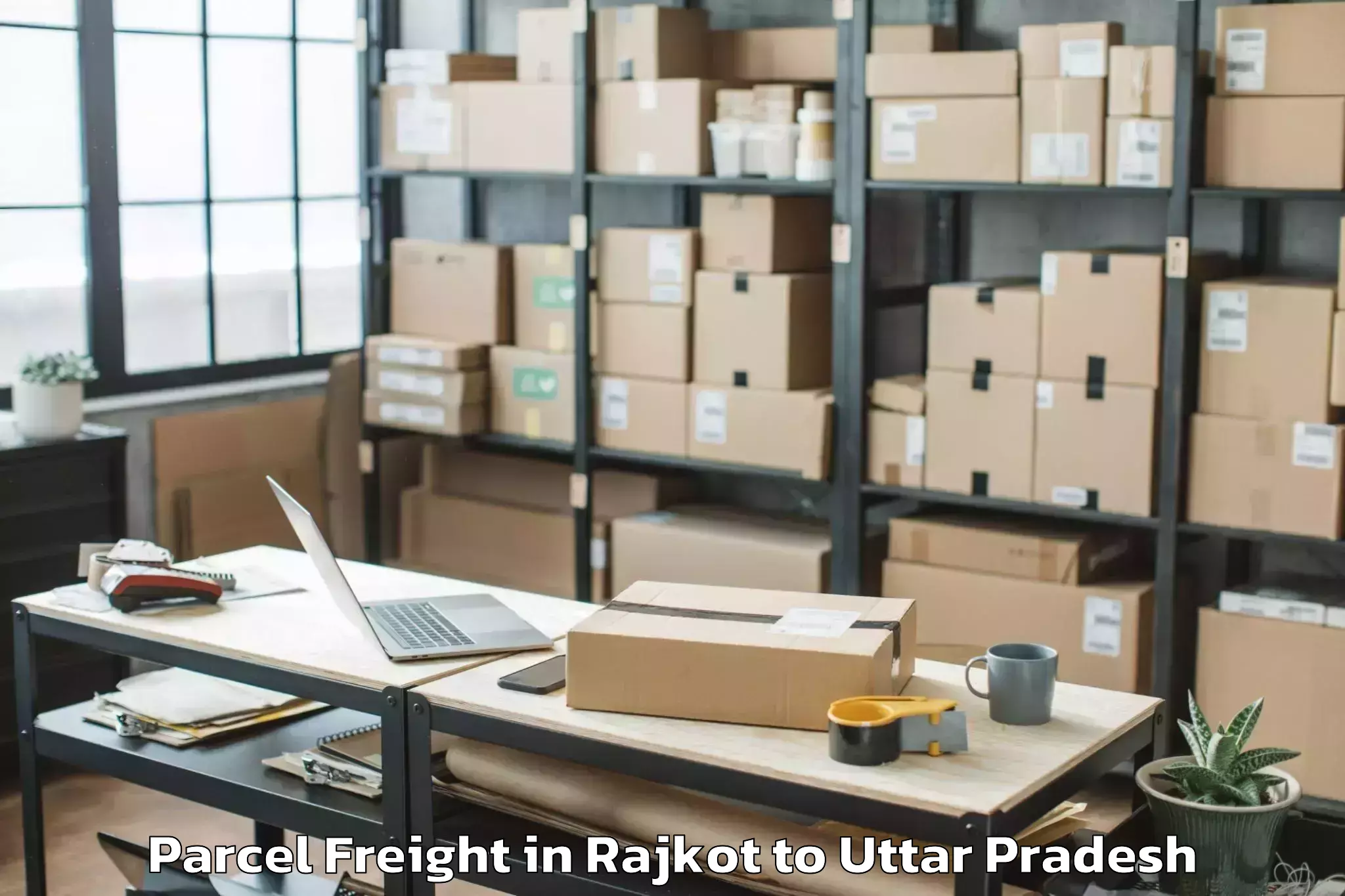 Leading Rajkot to Aonla Parcel Freight Provider